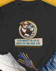 The womens t-shirt in black showcases a cute dog design with a pocket watch and the saying, Every moment you love me counts ten times more to me. Designed by Dog Gang.